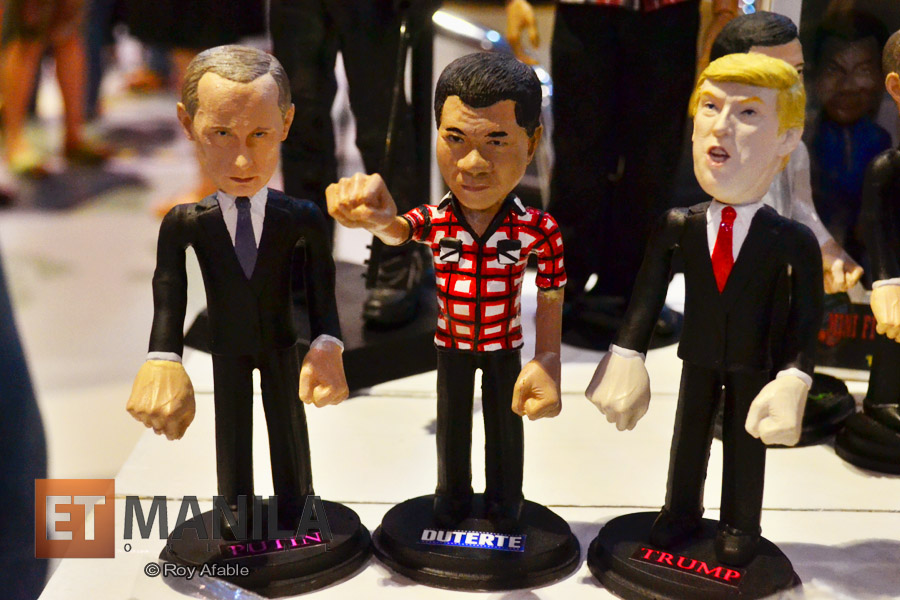 Strongmen Era: Russian President Vladimir Putin (left), Republic of the Philippines President Rodrigo Duterte (middle), United States President Donald Trump (right) action figures on display at one of the booths selling toys at 2018 Toycon Philippines PopLife Fan Xperience. - Roy Afable
